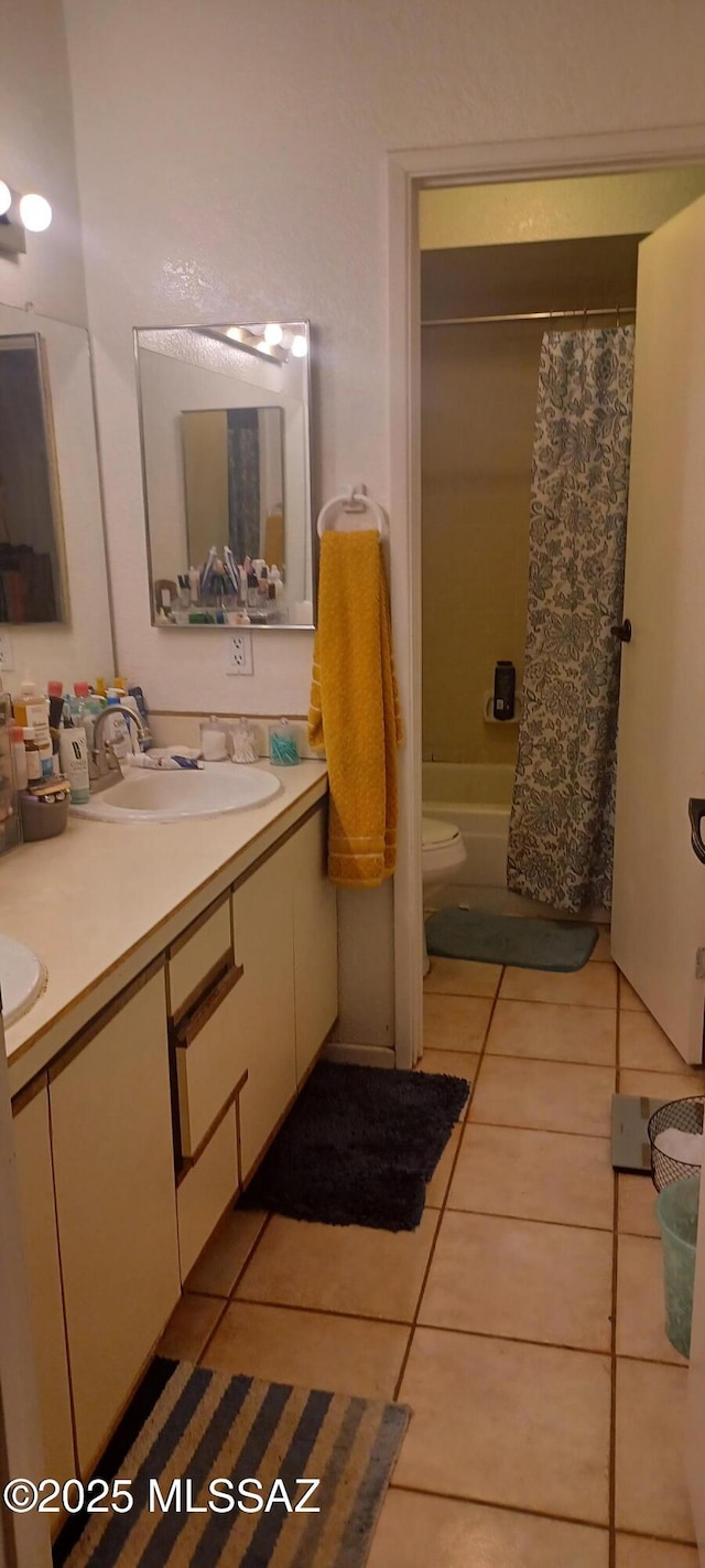 4081 N Hidden Cove Pl, Tucson, AZ 85749 - full bathroom featuring tile patterned floors, double vanity, toilet, and shower / bath combo