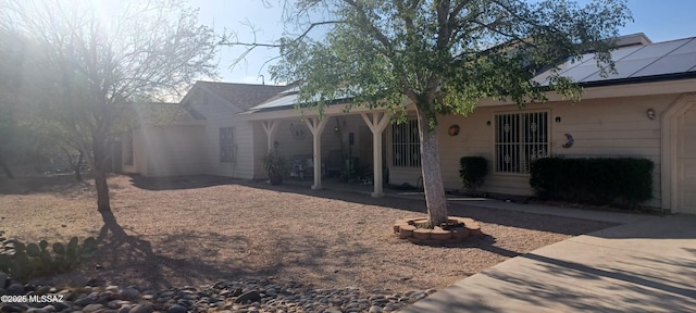 4081 N Hidden Cove Pl, Tucson, AZ 85749 - back of house with roof mounted solar panels