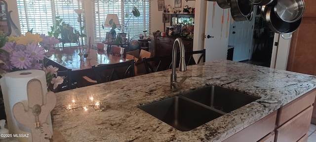 4081 N Hidden Cove Pl, Tucson, AZ 85749 - kitchen featuring a sink and light stone counters