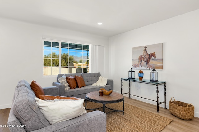2610 E Elm St, Tucson, AZ 85716 - living area with wood finished floors, baseboards, and recessed lighting