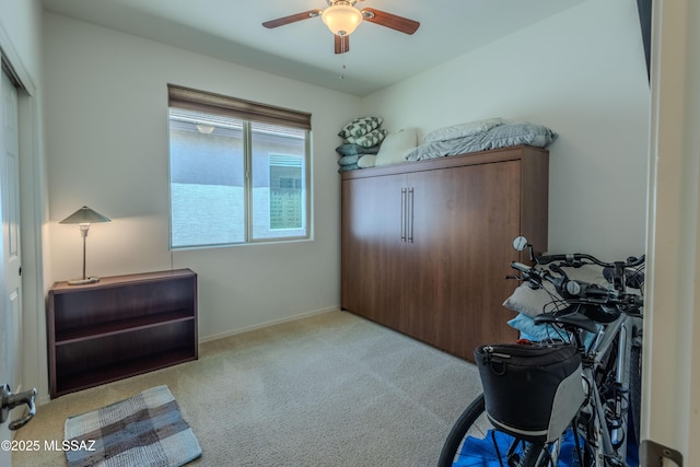 1104 W Pastora Peak Dr, Green Valley, AZ 85614 - carpeted bedroom with ceiling fan and baseboards
