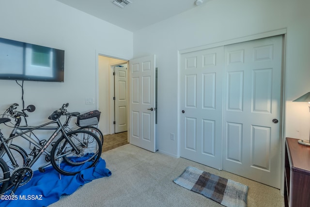 1104 W Pastora Peak Dr, Green Valley, AZ 85614 - bedroom featuring light carpet and a closet