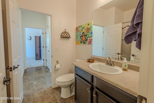 1104 W Pastora Peak Dr, Green Valley, AZ 85614 - bathroom with vanity, toilet, and tile patterned flooring