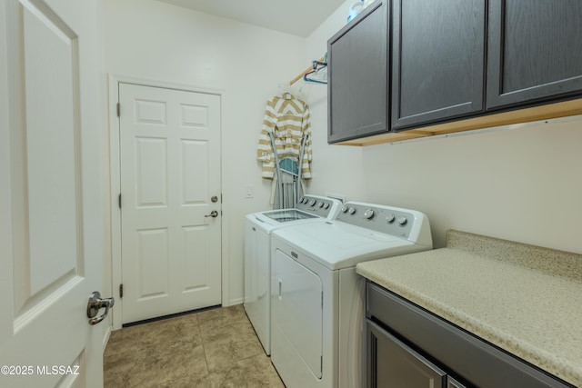 1104 W Pastora Peak Dr, Green Valley, AZ 85614 - laundry area with cabinet space and washing machine and clothes dryer