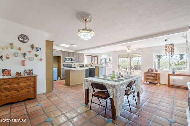 2621 W Rapallo Way, Tucson, AZ 85741 - dining room with a textured ceiling, light tile patterned flooring, and ceiling fan