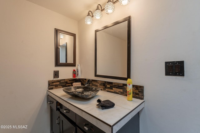 2621 W Rapallo Way, Tucson, AZ 85741 - bathroom with backsplash and vanity