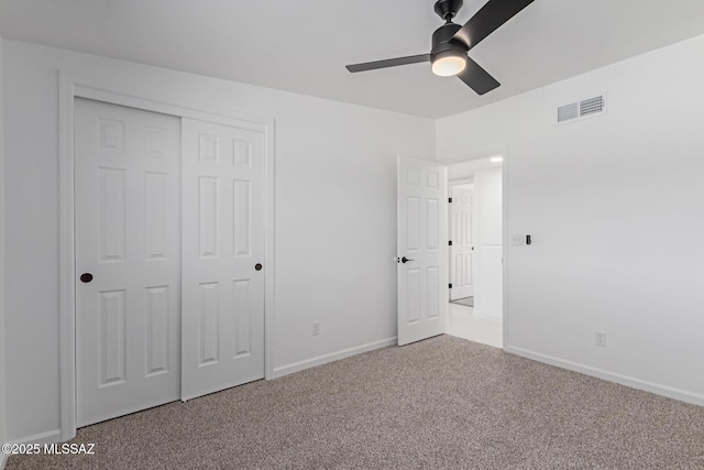 2302 S Cathy Ave, Tucson, AZ 85710 - unfurnished bedroom featuring carpet flooring, a closet, and ceiling fan