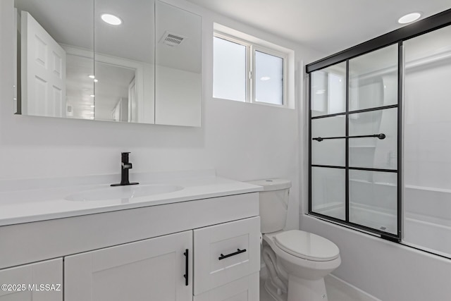 2302 S Cathy Ave, Tucson, AZ 85710 - bathroom featuring vanity, combined bath / shower with glass door, and recessed lighting