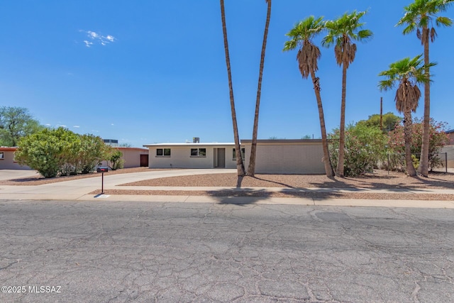 2302 S Cathy Ave, Tucson, AZ 85710 - view of front of house featuring driveway