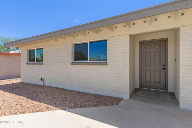 2302 S Cathy Ave, Tucson, AZ 85710 - view of exterior entry with brick siding