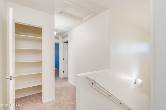 8045 S Red Sox Rd, Tucson, AZ 85756 - hall featuring attic access, carpet, an upstairs landing, and baseboards