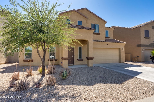 8045 S Red Sox Rd, Tucson, AZ 85756 - mediterranean / spanish-style home with concrete driveway, a tiled roof, stucco siding, and an attached garage