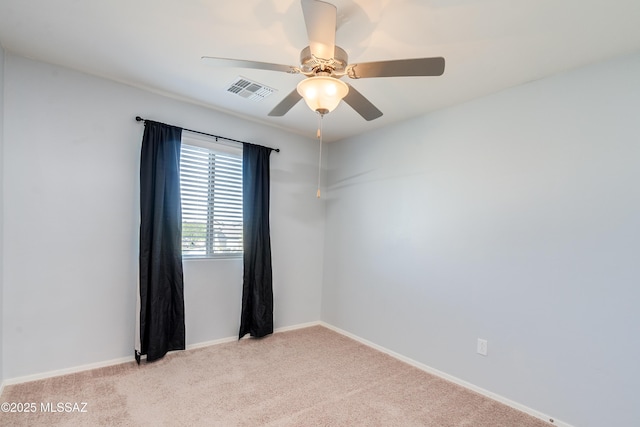 8045 S Red Sox Rd, Tucson, AZ 85756 - spare room with carpet, a ceiling fan, and baseboards