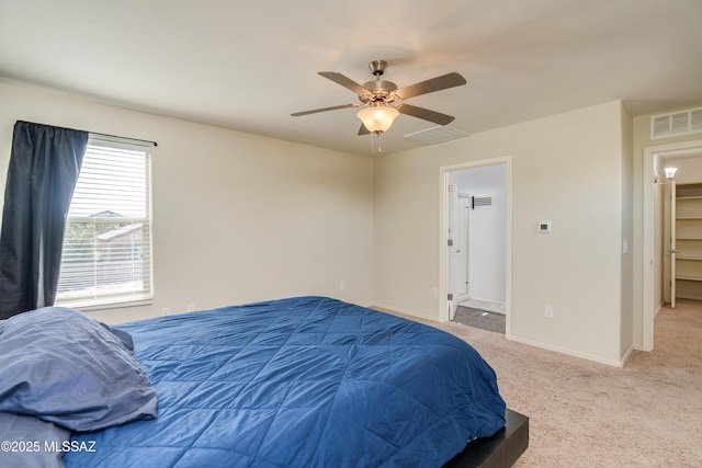 8045 S Red Sox Rd, Tucson, AZ 85756 - carpeted bedroom featuring baseboards and a ceiling fan