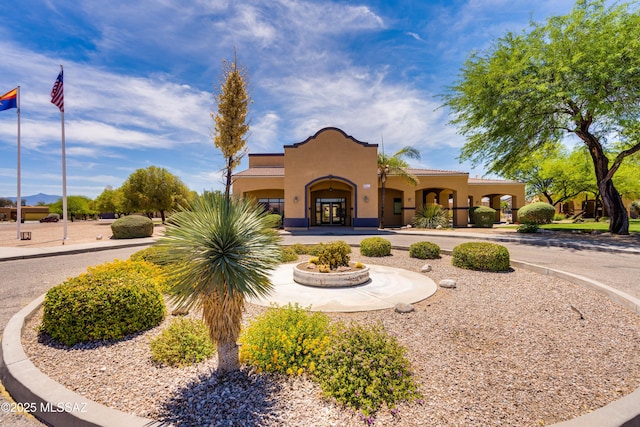 8045 S Red Sox Rd, Tucson, AZ 85756 - mediterranean / spanish house with stucco siding and french doors