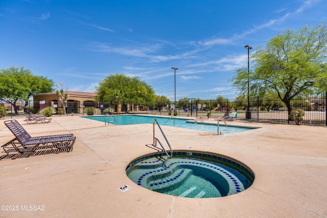 8045 S Red Sox Rd, Tucson, AZ 85756 - community pool with a community hot tub, fence, and a patio