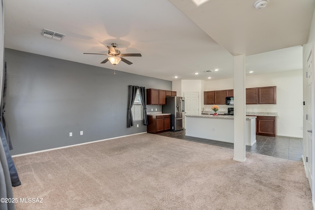 8045 S Red Sox Rd, Tucson, AZ 85756 - unfurnished living room featuring dark colored carpet, ceiling fan, recessed lighting, and baseboards