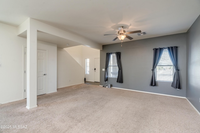 8045 S Red Sox Rd, Tucson, AZ 85756 - carpeted empty room featuring a ceiling fan and baseboards