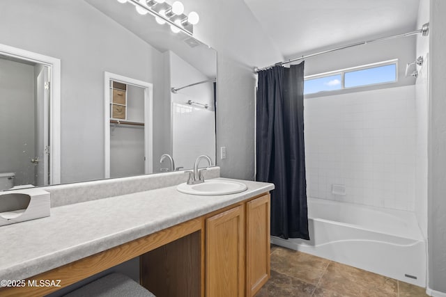8807 S Desert Rainbow Dr, Tucson, AZ 85747 - bathroom featuring shower / tub combo, vanity, and toilet