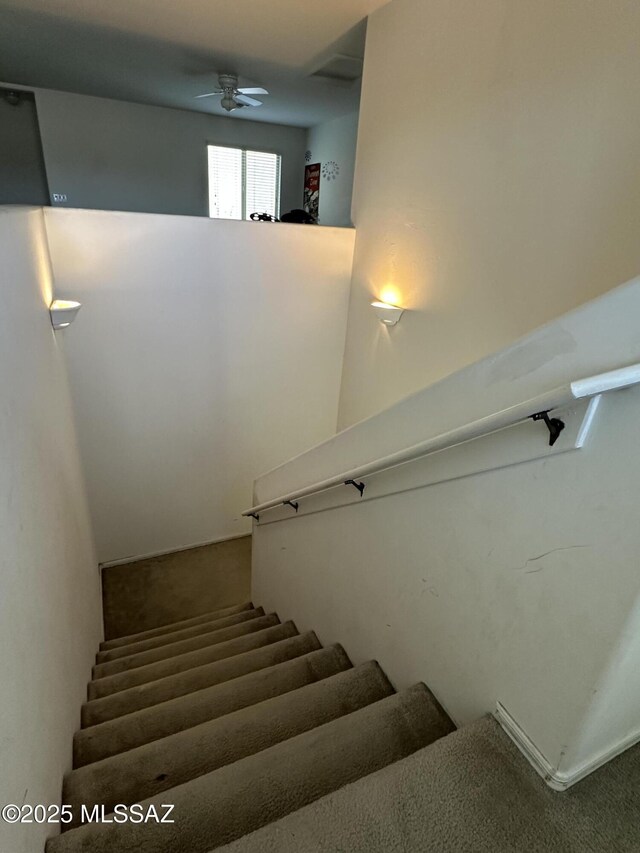 1027 E Madera Grove Ln, Sahuarita, AZ 85629 - stairway featuring ceiling fan