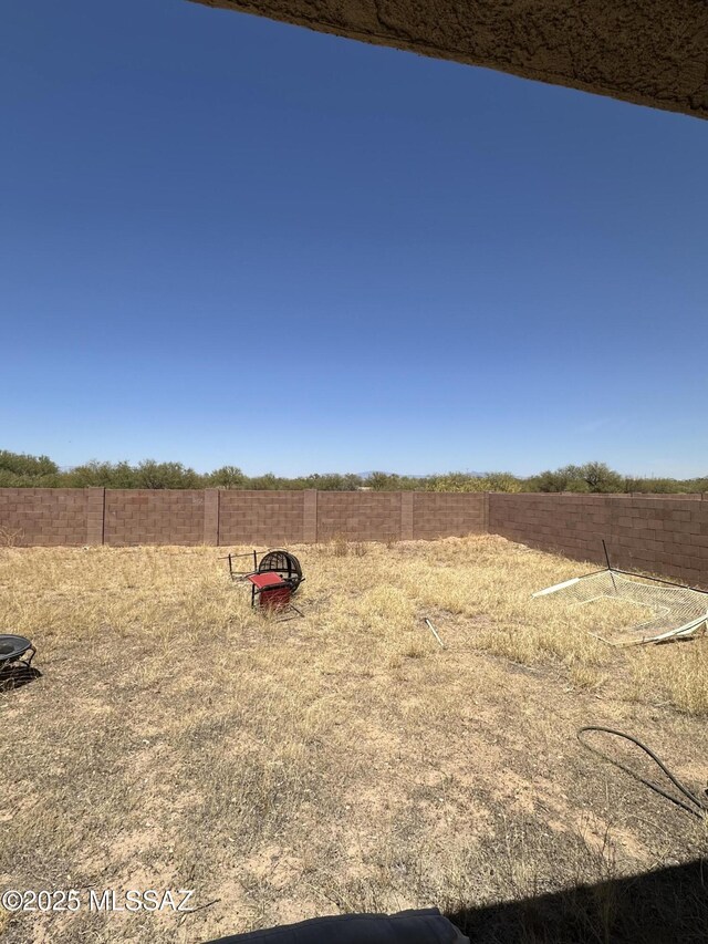 1027 E Madera Grove Ln, Sahuarita, AZ 85629 - view of yard featuring fence