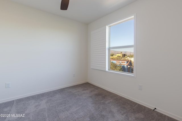 1126 E Cairn St, Tucson, AZ 85719 - unfurnished room featuring ceiling fan, carpet, and baseboards