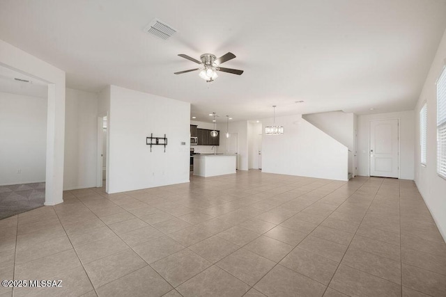 14259 E Yellow Sage Ln, Vail, AZ 85641 - unfurnished living room with a ceiling fan, light tile patterned floors, and a sink