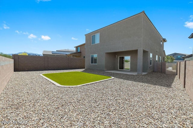 14259 E Yellow Sage Ln, Vail, AZ 85641 - rear view of house featuring a patio, a fenced backyard, and stucco siding