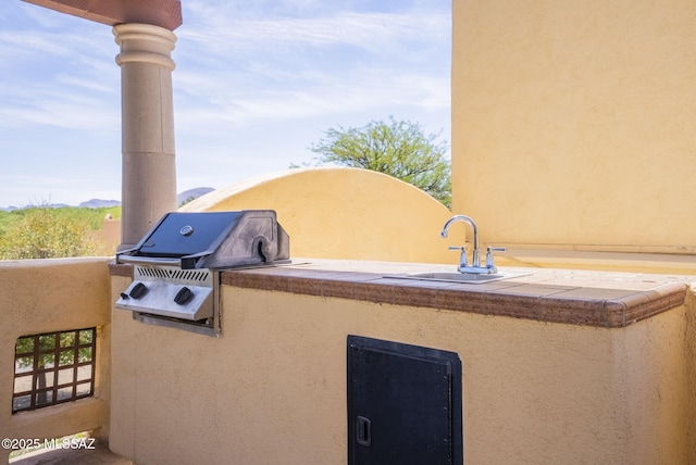 110 Post Way, Tubac, AZ 85646 - view of patio / terrace with exterior kitchen, a grill, and a sink