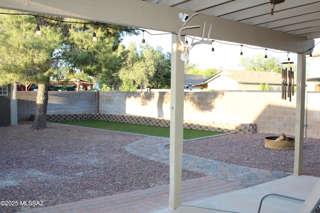 7747 S Lions Spring Way, Tucson, AZ 85747 - fenced backyard featuring a patio area