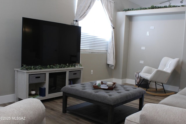 7747 S Lions Spring Way, Tucson, AZ 85747 - living room with wood finished floors and baseboards