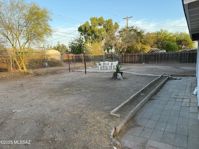 4910 N Gold Ave, Tucson, AZ 85705 - view of yard featuring fence and a patio