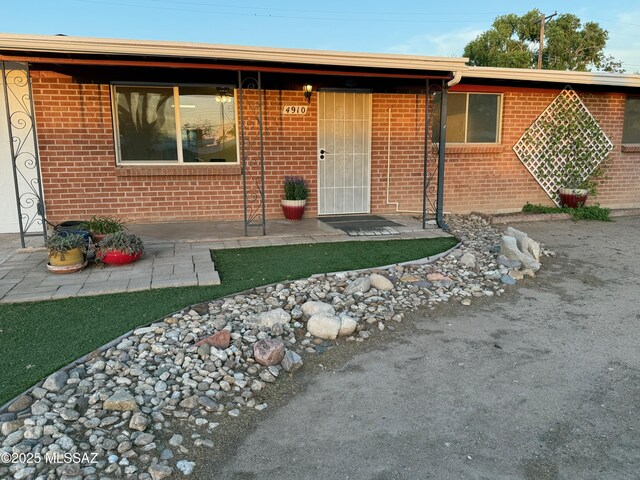 4910 N Gold Ave, Tucson, AZ 85705 - view of front of house with brick siding