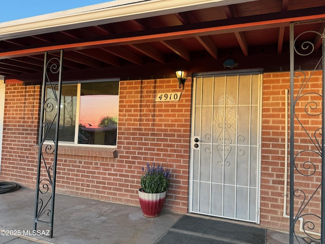 4910 N Gold Ave, Tucson, AZ 85705 - property entrance featuring brick siding