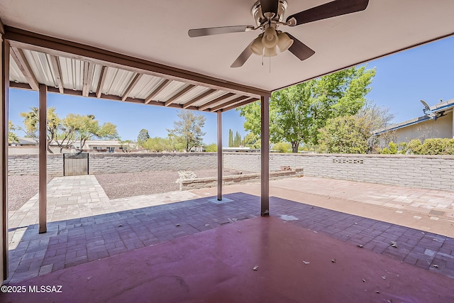 140 W Calle Melendrez, Green Valley, AZ 85614 - fenced backyard featuring a patio area and ceiling fan