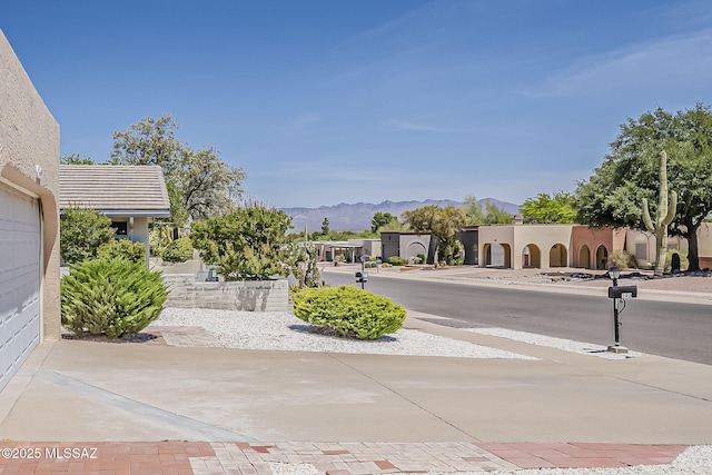 140 W Calle Melendrez, Green Valley, AZ 85614 - view of road featuring a mountain view and sidewalks