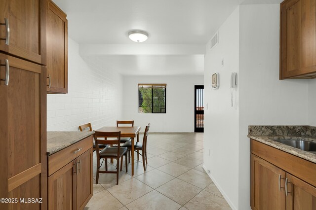 135 S Paseo Quinta Unit D, Green Valley, AZ 85614 - dining space with light tile patterned flooring