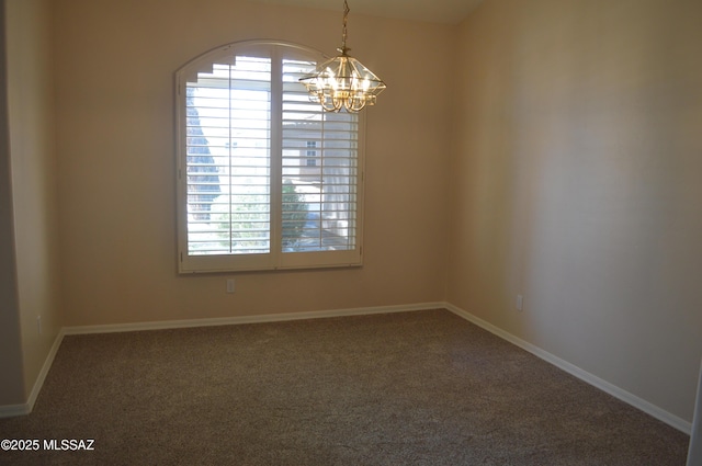 1645 E Ganymede Dr, Tucson, AZ 85737 - unfurnished room with a chandelier, plenty of natural light, carpet flooring, and baseboards