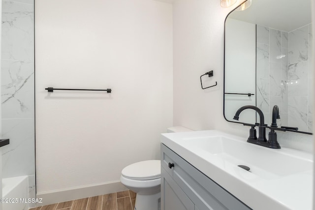 1200 S Alpine Cir, Green Valley, AZ 85614 - full bath with toilet, vanity, wood finished floors, baseboards, and a shower