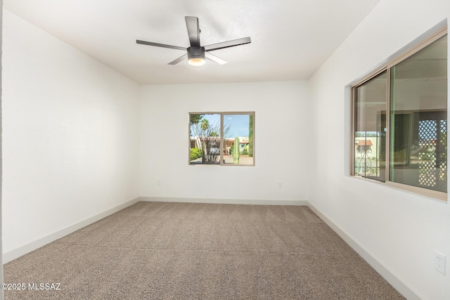 1200 S Alpine Cir, Green Valley, AZ 85614 - spare room with carpet, a ceiling fan, and baseboards