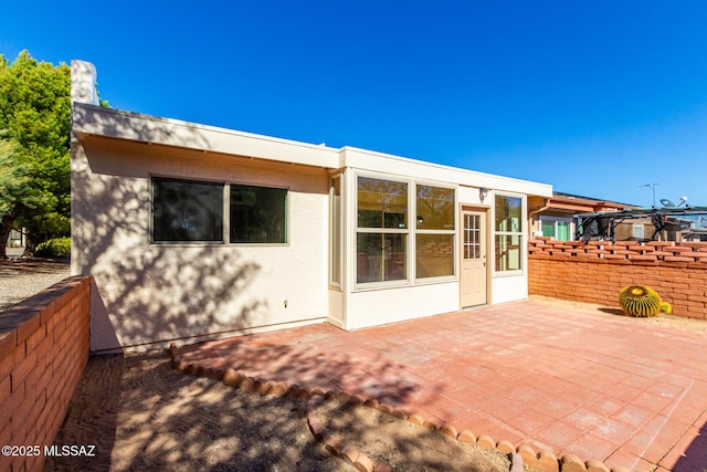 1200 S Alpine Cir, Green Valley, AZ 85614 - back of property featuring a patio, stucco siding, and fence