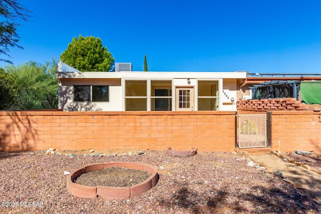 1200 S Alpine Cir, Green Valley, AZ 85614 - single story home with a gate