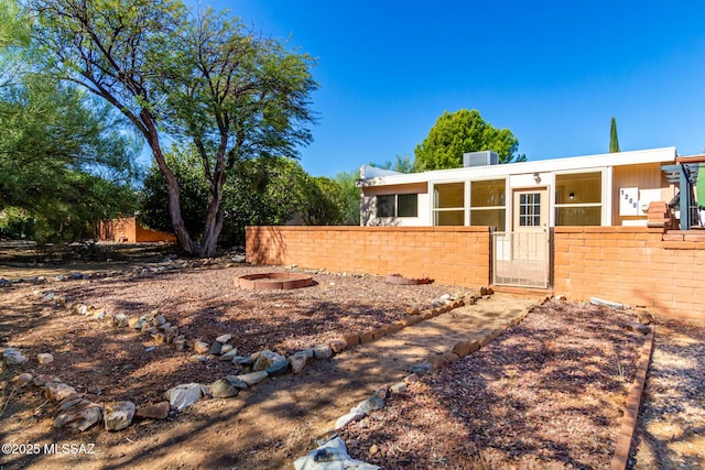 1200 S Alpine Cir, Green Valley, AZ 85614 - view of front of house with a gate
