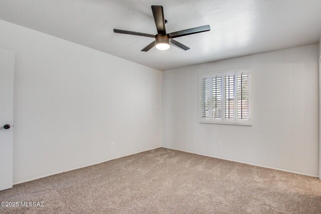 9570 E Sellarole Rd, Tucson, AZ 85730 - carpeted empty room featuring a ceiling fan