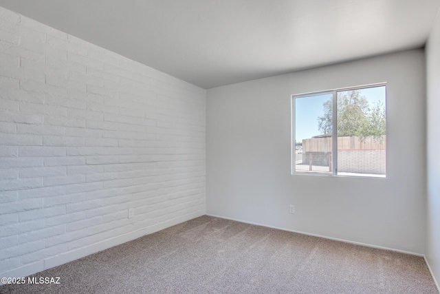 9570 E Sellarole Rd, Tucson, AZ 85730 - carpeted spare room with baseboards