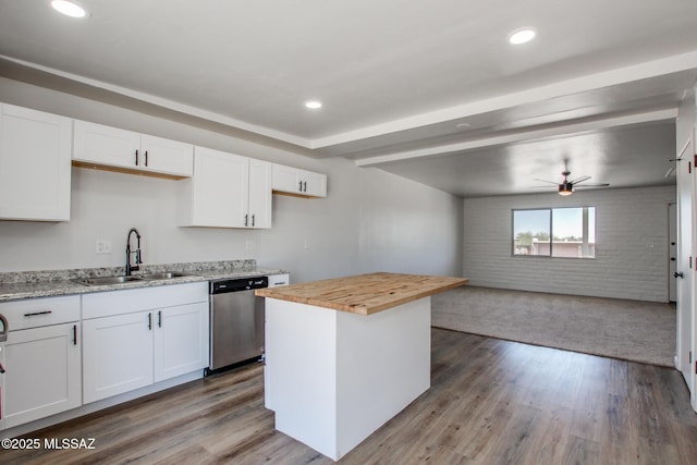 9570 E Sellarole Rd, Tucson, AZ 85730 - kitchen featuring dishwasher, a sink, butcher block counters, ceiling fan, and white cabinets