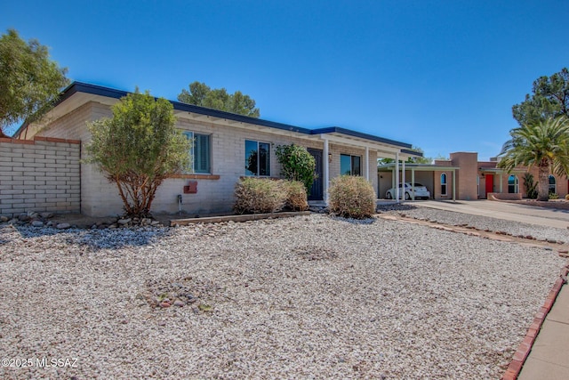 9570 E Sellarole Rd, Tucson, AZ 85730 - view of front of home with concrete driveway