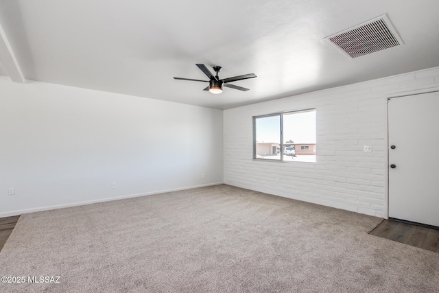9570 E Sellarole Rd, Tucson, AZ 85730 - carpeted spare room with ceiling fan and baseboards