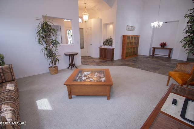 4416 N Saddle View Dr, Tucson, AZ 85750 - carpeted living room with a chandelier and a high ceiling