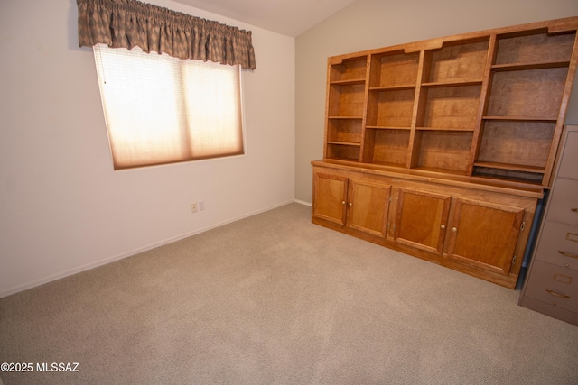 4416 N Saddle View Dr, Tucson, AZ 85750 - unfurnished room featuring light carpet, lofted ceiling, and baseboards